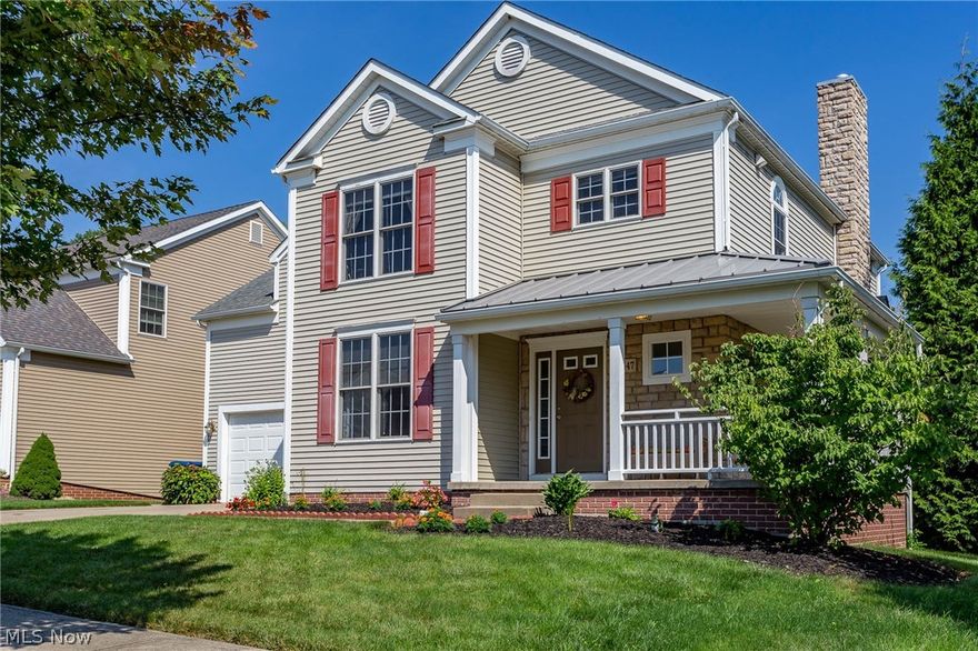 Custom built in 2006 in the highly desired Village of Glenwillow of Solon. This amazing 2298sqft, 4 bedroom, 2.5 bath Colonial has a wrap-around front porch with metal roof and great curb appeal. No rear neighbors! Meticulously landscaped! A beautiful foyer greets you with gorgeous hard wood floors and arched entryways. The first floor has 9ft ceilings throughout.  The kitchen has floor to ceiling cabinets, lots of counter space, and all appliances are included. The sunny Morning Room extends off the kitchen, with full windows and overlooking the private , wooded backyard.  A sliding door leads to the elevated deck for entertaining outdoors. The Living room has a gas fireplace and built-in bookshelves.  The Dining Room has a tray ceiling, and is currently used as an office/family room. First floor includes a half bath and a spacious laundry room.  The Master Bedroom has vaulted ceiling, master bath, and a large walk-in closet. 4 spacious bedrooms upstairs, including a 17x17 bedroom wit