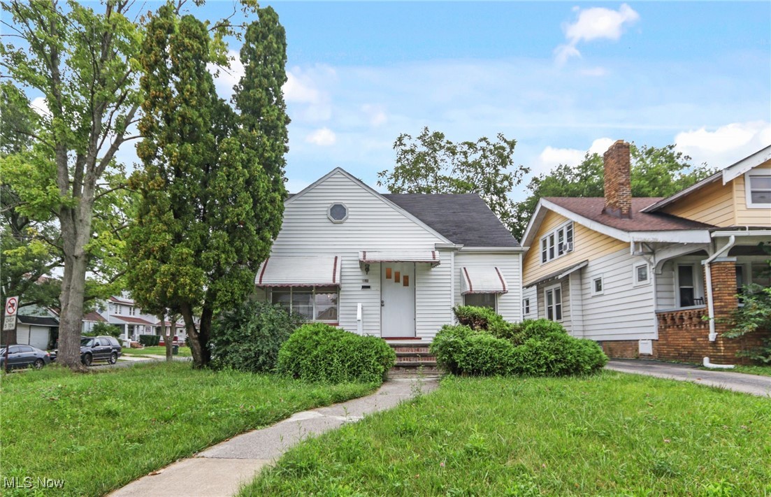 Welcome to this updated bungalow featuring 4 bedrooms, 2 full bathrooms and a 1-car attached garage! The exterior features a nice roof, vinyl siding, brick foundation and a concrete driveway with plenty of off street parking. When you walk in you will notice the refinished hardwood flooring throughout the 2 1st floor bedrooms, dining room, living room along with all NEW paint and trim and a nice kitchen with plenty of cabinetry and countertop space with a stainless steel stove. The upstairs was fully finished out with 2 additional bedrooms with large closet spaces each! The basement was just painted, dry locked and has updated electrical panels, a NEW hot water tank and more. The 2025 Garfield Heights Point of Sale violations are all completed and cleared! Come check out 4431 E 131st in Garfield Heights today!