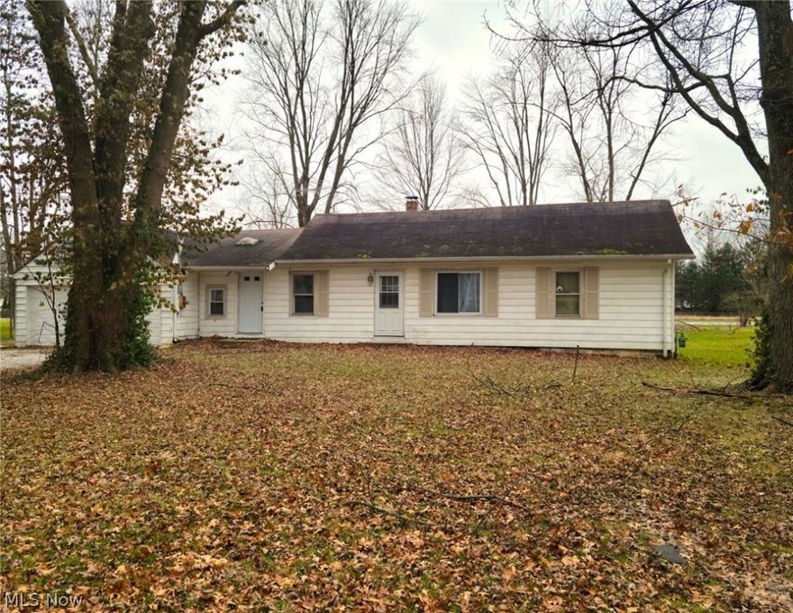 Much potential in this 3 bedroom ranch home!  Paint, carpet and some elbow grease can turn this place around.  2 car attached garage.  Fireplace in the family room.  Located on a quiet dead end street.  Over a half acre lot.  Convenient location.  Country like setting in the city.