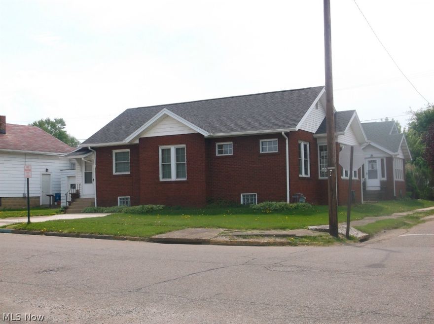 Lovely 2 bedroom ranch home close to the hospital with off street parking. Some of the many updates include: Beautiful hardwood floors, driveway, windows, bath, plumbing & electric.