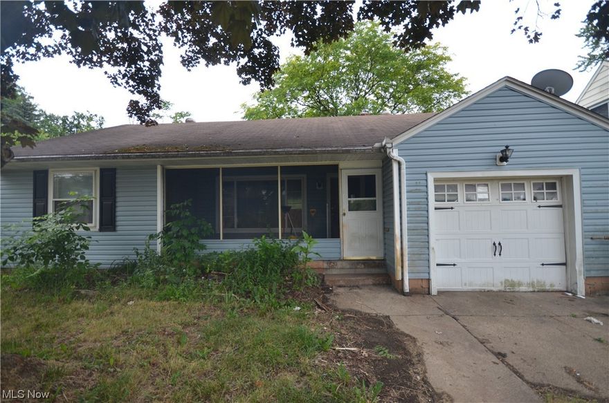 Investment opportunity in Goodyear Heights! Ranch home w oversized 1 car attached garage (nearly 12x22) plus a fenced in back yard with shed. Home is in need of work- but has incredible potential. Screened in front porch leads to the living rm w hardwood floors. Arched doorway to dining rm w hardwood floors & kitchen w good space. Two nice sized bedrooms with hardwood floors plus a full bath w step in shower and linen closet. The basement even has a rec room w bar and a half bath! This is a great opportunity to rehab for resale, enjoy as your own home or a great rental. Ranch style homes w attached garages are hard to come by- so don't miss out on the opportunity! Unsure of AC function, a few windows are broken, home has animal smell. Just replaced June '23: Electrical (Square D Homline 100 AMP panel, New Breakers, Replace bonding/grounding, Drive 2-8" ground rods, 6 ' apart. New #4 bare conductor to waterline from main panel ground bar, ground and jump water meter. Use 2 water pipe cl
