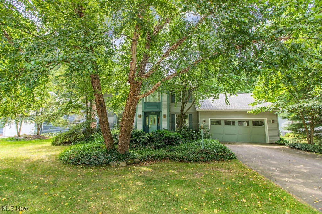 Welcome Home to Comfort and Charm in the Revere School District. This is the one you’ve been waiting for! Tucked away on a quiet cul-de-sac in the highly rated Revere School System, this meticulously cared-for colonial offers both space and serenity. Step into a spacious foyer that opens to a bright living room and formal dining room perfect for entertaining. The heart of the home is the open-concept kitchen and cozy family room, complete with a gas fireplace, custom built-ins, and views of the private backyard. Step outside onto the deck and unwind next to the butterfly garden your own peaceful retreat.
Upstairs, the expansive primary suite features an additional room ideal for a home office, sitting area, or nursery. The en suite bathroom offers double sinks and plenty of space to start and end your day in comfort. Two more generously sized bedrooms and a full bath complete the upper level.
The partially finished lower level adds flexible space for a rec room, gym, or media area.
Major updates include: Roof (2020) Furnace & A/C (2022) Hot Water Tank (2023)Sump Pump (2024) Don’t miss your chance to own this beautiful, move-in-ready home in one of the area’s most desirable school districts. Schedule your private showing today!