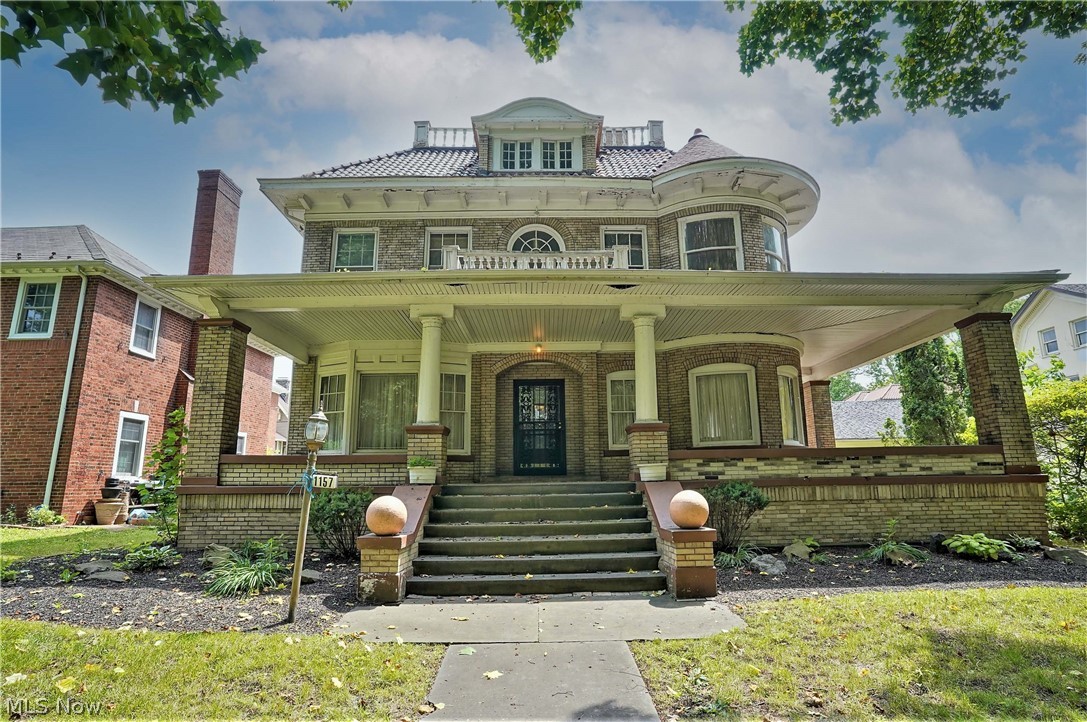 Welcome to this historical, classy colonial home with a beautiful front porch and original pillars where you can sit out and just enjoy the scenery. There are large picture windows, woodwork, and hardwood floors throughout. Large stunning dining room with built in cabinets. The large, timeless living room has a brick fireplace with mantle and built ins. Gorgeous, bright updated kitchen (2018) offering granite counters, abundant of cabinets, dishwasher, cooktop, oven, built in microwave, refrigerator, and eat in area. WOW! First floor laundry and half bath. Upstairs you will find the master suite closet which has built ins. Second bedroom has walk in closet with built ins and there are two more bedrooms and large bright full bathroom on the second level. On the third level there is another full bathroom offering a claw tub and large cedar closet and four more bedrooms. Two car attached garage. Cultural Gardens. View of the park. Minutes from hospitals. Elegant simplicity on this authent