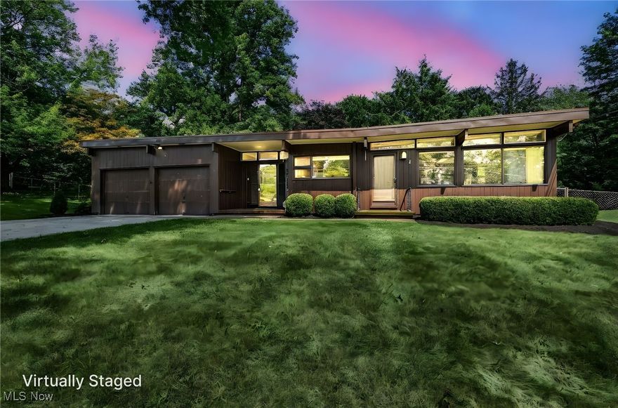 Step into timeless style with this Mid-Century Modern gem in the heart of Wooster. Built in 1954 and offering 1,824 sq ft of living space, this 3-bedroom, 2-bath home showcases the clean lines, open floor plan, and natural integration that define the era. Expansive windows invite sunlight and bring the outdoors in, while wood, stone, and other natural elements create warmth and character. Set on a generous 1.4-acre lot—a rare find within the city limits—you’ll enjoy an exceptional sense of privacy and space, perfect for gardening, entertaining, or simply taking in the view. The home’s layout emphasizes function and flow, with spacious gathering areas, a connection to the surrounding landscape, and the distinctive architectural details that make mid-century homes so sought-after. Located in the City of Wooster, this property offers convenient access to shopping, dining, schools, and parks while providing the serenity of a large lot. Whether you appreciate iconic design, desire room to grow, or simply want a home that feels both classic and modern, this property delivers.