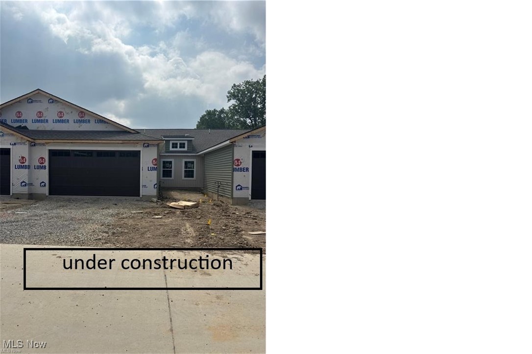 BRAND NEW RANCH COMMUNITY WITH A NEW/AMENDED FLOORPLAN, first of this design with an expanded 1428 sq ft TO BE BUILT! Welcome to Windsor Place! Nestled in the highly desired Northside of Elyria location placing you just minutes from LCCC, daily retail/dining, school/park conveniences, I-90/254! VA facility and medical offices within 2 miles! 12 miles from Crocker Park! Two golf courses and seven parks within in minutes! Beautiful curb appeal in an earthy green toned siding complete with shake, vinyl board + batten accents and a dark brown stained garage door with windows! Step into a handy entry foyer with double coat closet. The entire home has 9ft ceilings, except for the spacious great room with a soaring vaulted ceiling for an added airy feel! Efficiently planned kitchen offers a pantry, expanded drawer base cabinet, stainless steel appliances package, breakfast bar seating for 4! Spacious dining area has LVP flooring and is the center of the home, great for having guests over! Spacious living room w/ vaulted ceiling. Main bath has a linen closet. Owner's bedroom is spacious and offers a 6x11 walk in closet! The owner's bath offers a linen closet, 42" vanity cabinet and a one piece vinyl shower with a seat! Laundry room has a utility sink and a spacious storage closet (perfect for bulk items or seasonal decor) The attached garage is 21x23, MUCH larger than others standard garage dimensions! 10x12 patio included in the base price! This is on a desired homesite that overlooks a retention basin/pond! Construction has begun and this one is expected to be complete 8/1. You can also select other homesites and semi-customize some of the finishes! Other quick move in homes available in the community. End unit premium is $4,000. One time HOA initiation fee paid at closing of $400, $150 MONTHLY HOA includes lawn mowing, snow removal of driveways/walks/street. No age restrictions. One of the only options for A NEW CONSTRUCTION RANCH UNDER $250K in NEOHIO!