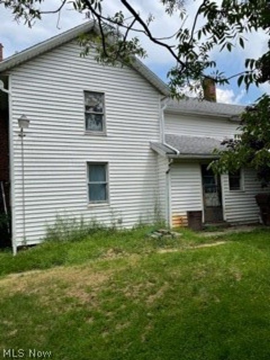 Looking for a farmhouse that you can Re-design, Re-create and/or Re-imagine?  This original farmhouse is beautifully situated among Paw Paw, Tulip, Pecan, Holly and Catalpa Trees and of course gorgeous Red Maples.  Among the trees you will enjoy sweet Blueberry and Blackberry bushes.   This home is waiting for the perfect buyer to bring it back to life.  Use your design imagination and bring in beautiful up-to-date touches and/or keep some of the old charm.  Sturdy and strong bones ready for remodeling.  Can be reconfigured to either a 4 or 5 bedroom home.  

UPDATED:  Septic 3/2019, Sump Pump 2/2021, Furnace 10/2020, Hot Water Tank 2019, Well Pressure Tank 6/2015, Well Jet Pump 6/2015