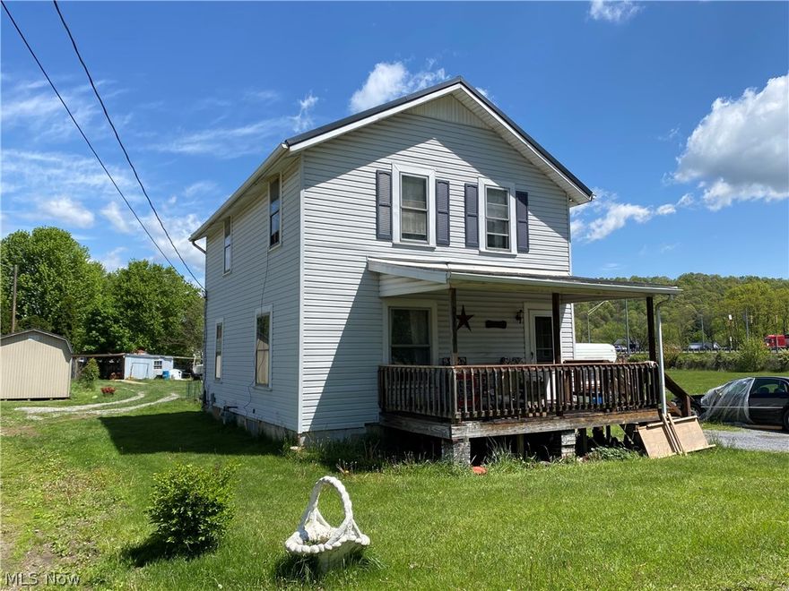 2-3 bedroom home ready for a new owner!  This home offers a large living room, dining room and kitchen all with updated flooring. Main floor laundry and bathroom with ceramic tile walk-in shower. 2-3 bedrooms and a full bathroom upstairs. Full basement. Covered back deck. 2 parcels totaling .28 of an acre. 2 carports attached to a storage building. New metal roof in 2020. Property is in an estate and selling as-is.