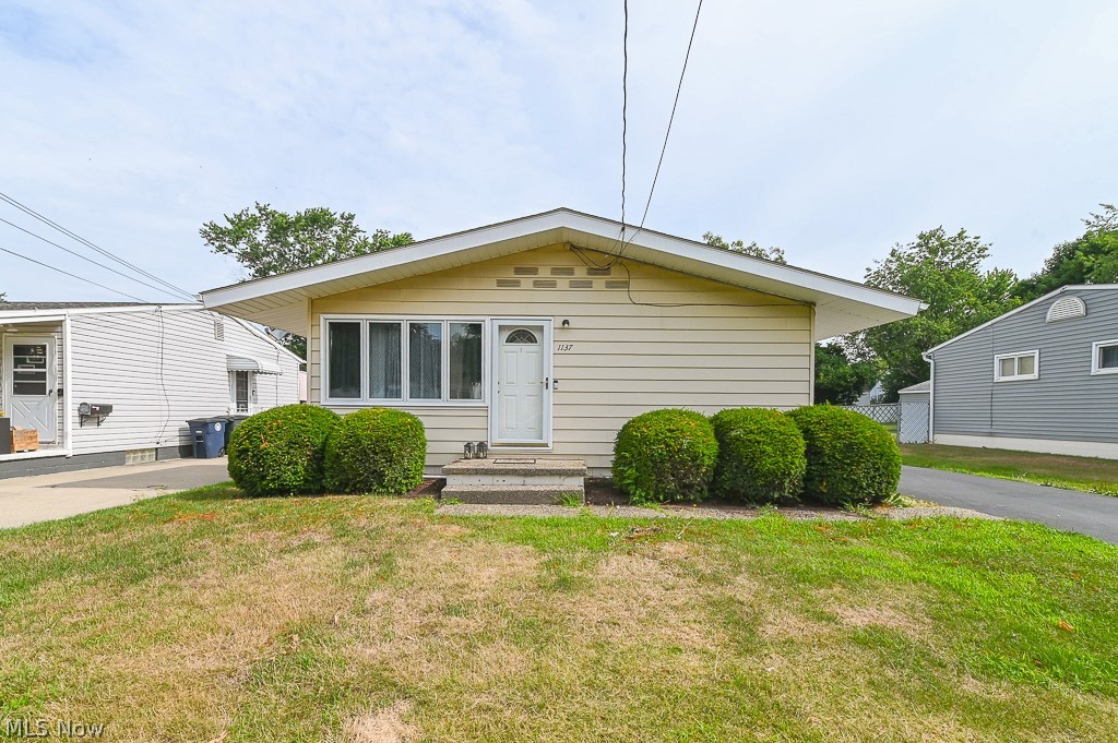 Welcome home to this charming ranch in Akron, OH. Just minutes away from the many attractions of Portage Lakes. Walk in the living room and you are greeted with plenty of natural light and beautiful hardwood floors. Completing the main floor are three bedrooms with sizeable closet space, full bath equipped with a jacuzzi tub and an eat-in kitchen that offers plenty of cabinets for storage. The lower level is partially finished and includes a bonus room, utility room, rec room and walk-in shower. Many updates over the last few years include: furnace (2023), air conditioner (2023), windows with lifetime warranty (2021), glass block windows with 10 year transferable warranty (2021), basement waterproofing with sump pump (2022), water meter (2023) and bonus room (2022). There is a two car detached garage and storage shed at the rear of home. Sellers are offering a one year home warranty for a peace of mind. Schedule a private viewing today!