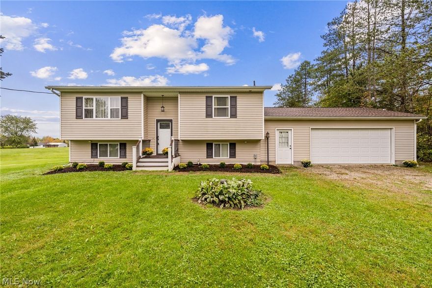 If you are looking for country living with 1.5 acres of gorgeous land to enjoy PLUS quick accessibility to highways, restaurants and shopping....then this house is for YOU!  Meticulously maintained, updated and MOVE-IN ready spacious bi-level home just waiting for its new owner!  You'll enter via the newer Trex stairwell (2016) through the gorgeous, exterior door w/decorative glass inlay (2014)!  Up the stairwell you'll find a spacious living room w/large picture window, and an electric fireplace, perfect for cozying up on the upcoming cold fall nights!  The dining room features laminate flooring and a sliding door that leads to the newly restored deck (2021) and backyard!  Nice size kitchen w/plenty of oak cabinetry, newer hardware and center island!  Large master bedroom w/fireplace and a HUGE bathroom w/large linen cabinet complete the first floor!  Down the stairs you'll find a lovely family room, perfect for movie or game night w/a fireplace too!  Two generously sized bedrooms and