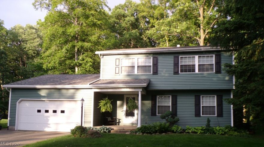 Wonderful lot with mature trees to rear and all public utilities. New deluxe siding and roof. Updated kitchen with Maple Cabinets and ceramic floors. Remodeled baths, cozy fireplace in the family room, waterproofed basement and high efficiency furnace. One year HMS Home Warranty provided. Easy access to I-76 and Rt 21.