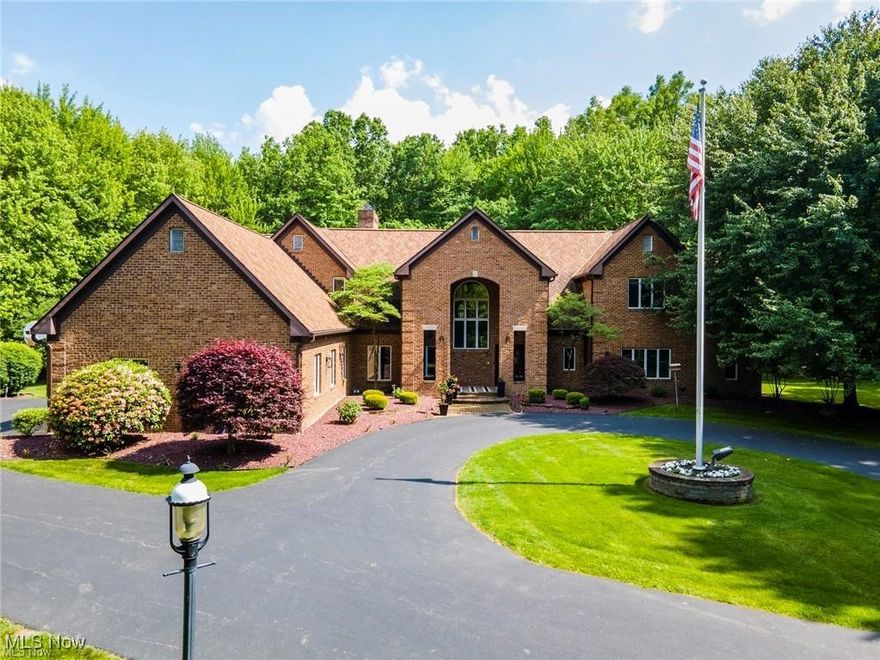 Absolutely MAGNIFICENT 4 Bedroom All Brick ESTATE with FREE GAS on 40+ Acres with 3 Bedroom Guest Home overlooking a 2 Acre Scenic "heart shaped" Lake, Indoor/Inground Pool, & 3 Car Attached/3 Car Detached Garage. Home Features Include: SPECTACULAR Open Great Room with Cathedral Ceilings, Floor to Ceiling Brick Gas Fireplace, & Wet Bar. The COMPLETELY UPDATED Kitchen has Custom Cabinets, Center Island, Breakfast Area, Pantry, Stainless Steel Appliances, Granite Countertops, & Trendy Backsplash. There is a HUGE Formal Dining Room with STUNNING Hardwood Floors & Crown Molding. The MASSIVE First Floor Master Bedroom with an Attached Office Area has Multiple Closets & an AMAZING Master Bath with Double Sinks, Vanity Area, Jacuzzi Tub, & Separate Shower. The First Floor Laundry Room plus 2 Half Baths complete the first floor. Second Floor offers a HUGE 2nd Master Bedroom with Attached Office Area, Walk In Closet, & Private Master Bath. The 3rd Bedroom has an Attached Office Area/Computer Room plus a Separate Bath, plus a 4th Bedroom with its own Private Bath. There is also a Large Storage Area, Walk In Closet, and Several Linen Closets. The Lower Level offers a MAMMOTH Recreation Area that offers Exercise Room, Ping Pong Area, Family Room Area with Fireplace, and Storage Area. The Back Indoor/Inground Pool has access from the Kitchen and offers a wall of windows for easy viewing plus a Hot Tub, Changing Room, Full Bath, & Sauna. The Private 3 Bedroom GUEST HOUSE overlooking the 2 Acre lake offers a LARGE Updated Kitchen with Breakfast Area, SPACIOUS Master Bedroom with Master Bath and tons of closets, 2 other Bedrooms, Two additional bathrooms, Plus an Loft Area with secret finished hide away. Updates Include: Whole House Generator to every room, Updated Kitchen, Updated Baths, All New Flooring, New Furnaces 2015-2016(5), Central Air(2015), New Hot Water Tanks(2022 & 2023), & New Roof on Home & Guest Home-2015.  The sq. ft. in MLS plus room/bath count is for both homes.