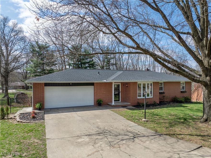 Welcome to your dream home! This beautifully revised ranch-style home on the southside of Phila offers a blend of modern updates and unique charm. Step inside to discover new carpet and LVP flooring throughout. The brand new kitchen boasts soft-close cupboards and a stunning cherry live bar, perfect for entertaining. With three spacious bedrooms, 2.5 baths, and a walkout basement, this home provides ample space for your family. Enjoy the convenience of a two-car garage and the privacy of a fenced-in backyard, complete with a cute little greenhouse and a gardener's paradise featuring raspberries, blackberries, 3 apple trees, a black cherry tree, and a herb garden located in the back corner by the compost.  Updates and additions to this home include :  roof and gutters,  furnace and AC,  water tank, outdoor greenhouse,  fence, washer and dryer,  dishwasher,  fridge and stove.  This red brick beauty is move-in ready.  Don't miss out on this great location—schedule your visit today!