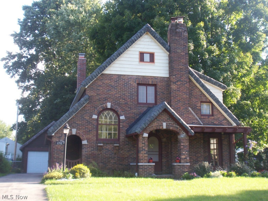 Old World Charm at it's best! Enjoy the updated Brick Colonial in desired River Estates. Updated roof (09), hot water tank (09), sliding door, chimney rebuilt (12), refinished hardwood floors (12). Innovative and distinctive features throughout the home. Spacious eat in kitchen, relax in the bright and cheerful living area overlooking fenced in rear yard. Coffee on the mosaic tile covered porch or rear patio. Near parks and school. Walk over to the beautiful river and enjoy nature at it's finest. Efficient hot water heating system.
