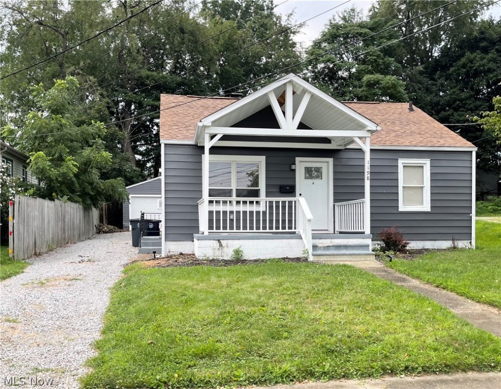 Welcome Home to this Adorable, Updated, 2 Bedroom, 2 Full Bath Home that is Move In Ready! This Home Offers an Inviting Covered Front Porch, Covered Back Deck with Views of the Spacious and Private Backyard, and 1 Car Garage! Inside You Will Find Newer Carpeting, Vinyl Flooring, And Fresh Paint! The Eat-In Kitchen has been Fully Updated with All New Appliances that Stay! Both Bedrooms are on the Main Level and 1 Offers a Wood Plank Accent Wall! There is an Updated Full Bath on the Main level as Well! The Upstairs is Finished which Offers a Spacious Area as an Office or Bonus Room! The Partially FInished Basement Offers a Large Rec Room with Built-in Bar, Additional Finished Room, Laundry Area, and another Full Bathroom with Shower Stall. Hot Water Tank is Less then 1 Year Old! 1 Year Home Warranty included as well! Don't Miss This One!