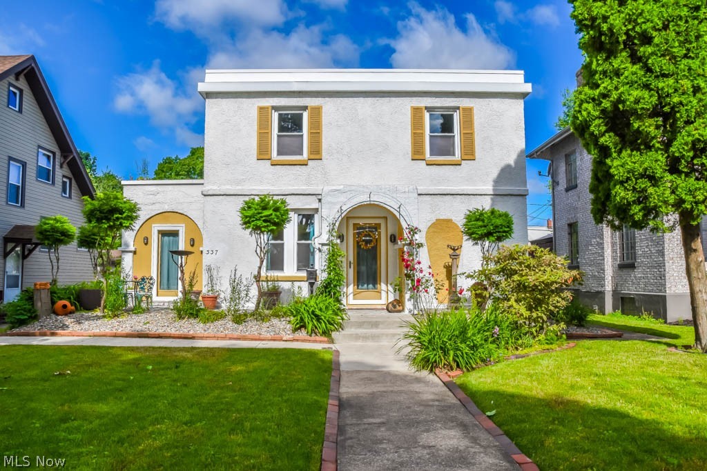 Situated on one of Canton’s classic brick streets lined with mature trees, this unique Mediterranean style home can’t be missed! Manicured curb appeal boasting a front patio with an arched covering to the front door. Inside, enjoy tile flooring, crown molding and arched entryways throughout. Enormous living room greets you as you enter, with 2 closets, dentil crown molding and a gas fireplace. Whip up your favorite recipes in the applianced kitchen with marble tile countertops and built-in pantry space in the dinette. Host holiday meals in the spacious formal dining room with French doors to the bright and cheery sunroom! This room has access to the front patio plus built-in shelving. The back bonus room could be an office or den. It has 2 closets, marble flooring, backyard access and an attached half bath with pedestal sink. Upstairs, the master bedroom measures 25x14 with crown molding, glass block windows, 2 closets and built-in shelving. If needed, this room could be converted back