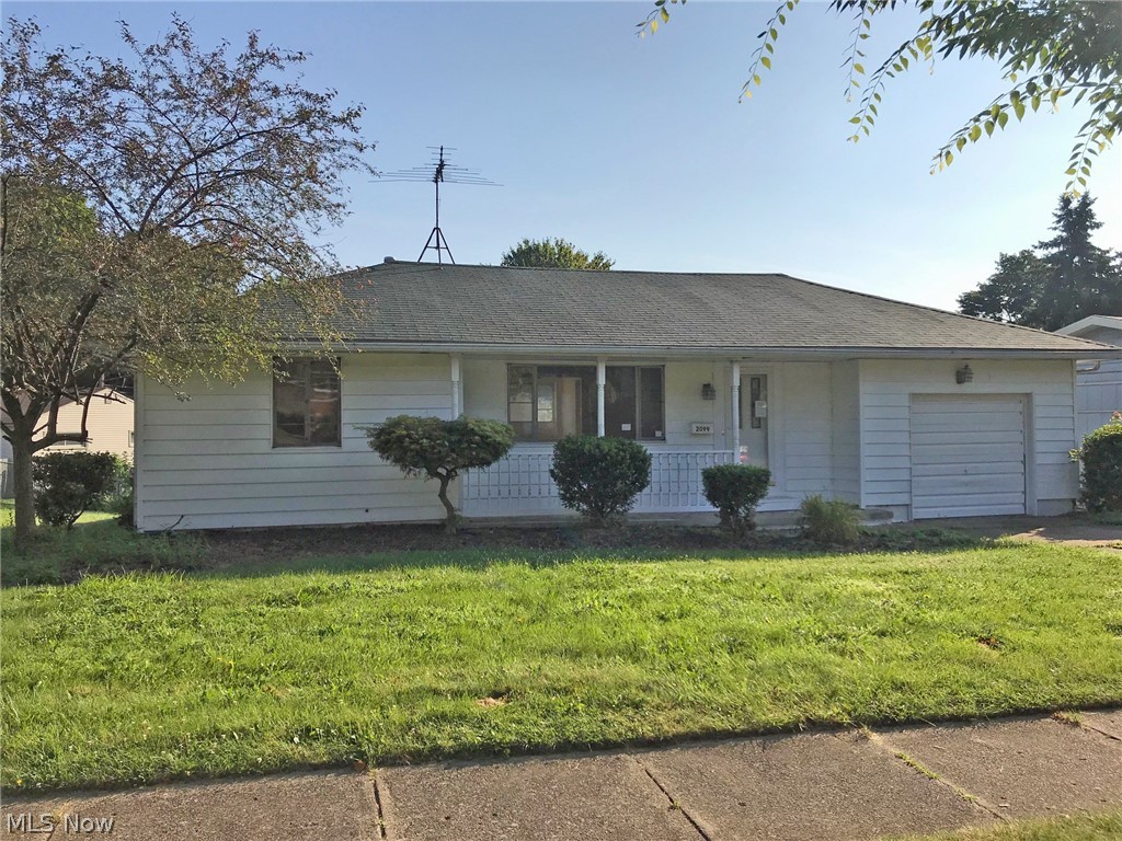 Wonderful opportunity to buy a great home that needs a little updating. Welcoming front porch brings you into a good size living room. From there venture to the dining room and kitchen or down the hall to bedrooms and bath. Original hard wood floors throughout. Kitchen offers pantry and direct access to garage for easy grocery carry in. Full open basement with bathroom and laundry, walls and floor are painted. Garage has built in storage. Easy access to shops, parks and schools, and quick access to highways! Property is sold AS-IS, seller will not make any repairs, guarantees or warranty.