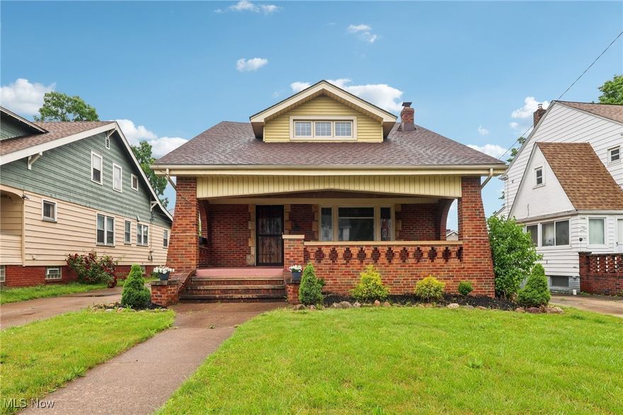 Step onto the inviting front porch of this beautifully maintained home in the sought-after Old Brooklyn neighborhood—your perfect spot to enjoy a morning coffee or unwind in the evening. Inside, the stunning stone fireplace serves as the focal point of a spacious living room, while the dining room boasts charming built-in corner cabinets with elegant leaded glass.

This home features two main-floor bedrooms, plus a versatile upstairs space that can serve as a generous primary suite, complete with its own half bath. The full bathroom on the main floor was recently converted to a full walk-in shower.  A newer addition at the back extends the living area and leads out to a deck, overlooking a fully fenced yard—ideal for entertaining or relaxing. And for those who need ample storage or workspace, check out the oversized three-car garage! This home boasts tons of storage on every floor! Close to shopping and easy highway access.  Don't miss the chance to make this inviting home yours!  Schedule your private showing before this one is gone!