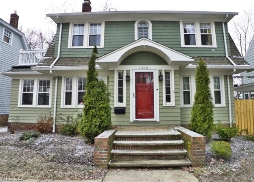 Charming Cleveland Heights Colonial with Turn key renovation in 2009. Newer tear off roof, furnace & central air, hot water tank & windows. Original character remains throughout. Refinished Oak floors, Living Room has wood-burning fireplace and opens to First floor Family Room/Sun Room. Kitchen has granite counters, stainless steel appliances including 5 burner gas stove. Home has 2 car attached garage! Cement driveway and fully fenced yard. Upstairs there are 3 bedrooms, one has large balcony, plus a remodeled main bathroom with ceramic tile & granite. Third floor Suite can be 4th bedroom or bonus room. Plenty of closets & storage. Minutes to hospitals, University, Museums, shopping & restaurants & much more