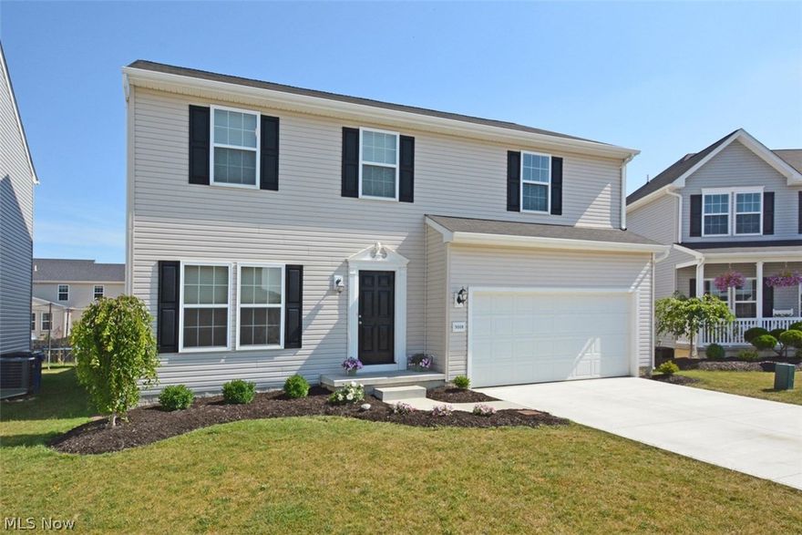 Located in Waterbury of North Ridgeville, this 2012 built colonial features an open floor plan and 9' ceilings. An amply sized play room on the first floor could become your office or formal dining room. The great room is filled with light and opens to the spacious Eat In Kitchen. Modern, dark cabinets, center island illuminated by pendant lighting, sleek black appliances and TWO pantries will delight the chef of the family! Sliders lead you outside from the eat-in area. Fully fenced backyard is LARGE and provides a great back drop for your finishing touches. Second floor laundry room is a treat, making quick work of dirty clothes, plus, a storage closet for extra linens and laundry supplies. Two amply sized bedrooms, one with a walk in closet and the other with a large, double closet will make your family or guests feel spoiled! The main bath is large and has a private linen closet. Master retreat is very large and has a personal linen closet along with a HUGE walk-in closet, as well