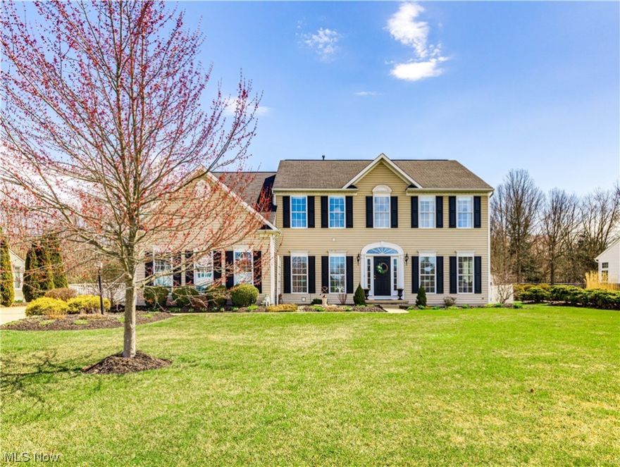 Spectacular Colonial home located on a double cul-de-sac street, boasting 4 Bedrooms, 4 Bath,  3297 SF PLUS a finished lower level! A roomy 2 story foyer gives access to the private office, formal living + dining w/ beautiful wainscoting! The fully equipped kitchen features stainless appliances, large center island + breakfast bar overlooking a beautiful morning room+ large family room w/ gas fireplace. Main fl. laundry+ 1/2 bath complete this spacious level. Second floor boasts an incredible primary suite w/ sitting area+ 2 huge walk in closets. Primary Bathroom features a tiled walk-in shower, soaking tub + double vanity. 3 sizable bedrooms + a guest bathroom round out the 2nd level. lower level includes a large recreation/media room, children's craft or hobby area, 3rd full bathroom +large bonus room w/closet. Exterior is completed w/ a composite deck, fully fenced yard, shed + wooded view! Home Warranty Included.