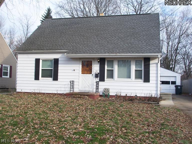 Welcome to this wonderful move in ready cape cod with finished basement. The 30x15 recreation area is a family room and eating area. This 3 bedroom 2 full bath home has approximately 1600+ square feet of living space. An oversized eat in kitchen has granite counter tops and a ceramic floor. The many updates include windows, roof, furnace, a/c, refrigerator, baths, some carpeting, and more. The master bedroom is 32x12!! There is also ample storage, glass block windows, and a garage. The large rear yard has a patio, and is privacy fenced.