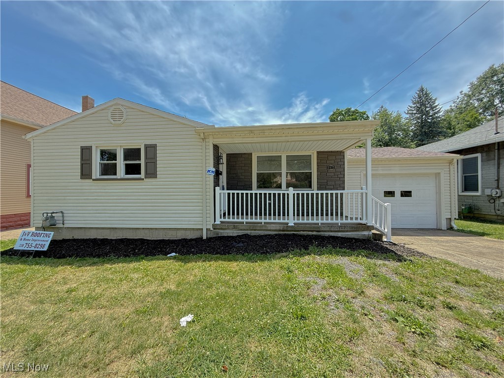Honey, stop the car—this adorable cream puff, in Struthers Schools, is all polished up and move-in ready! With so many updates, you’ll love the peace of mind that comes with a new roof, new furnace, new central air, new kitchen, new bathroom, new flooring, and fresh paint throughout. Step onto the welcoming covered front porch and into a bright living room featuring large windows and brand-new LVT flooring that flows seamlessly into the dinette and kitchen. Enjoy the benefits of vinyl windows, new counters with a ceramic backsplash, new cabinetry, and a full set of brand-new appliances. The primary bedroom offers a second closet, while the additional bedroom also features new carpeting. The updated full bath includes a new tub/shower surround and matching LVT flooring. The full basement has glass block windows, providing security and natural light. Don't forget about the one-car attached garage, back patio perfect for relaxing. Don't forget about the sidewalk lined streets. You will want to say YES to this address!