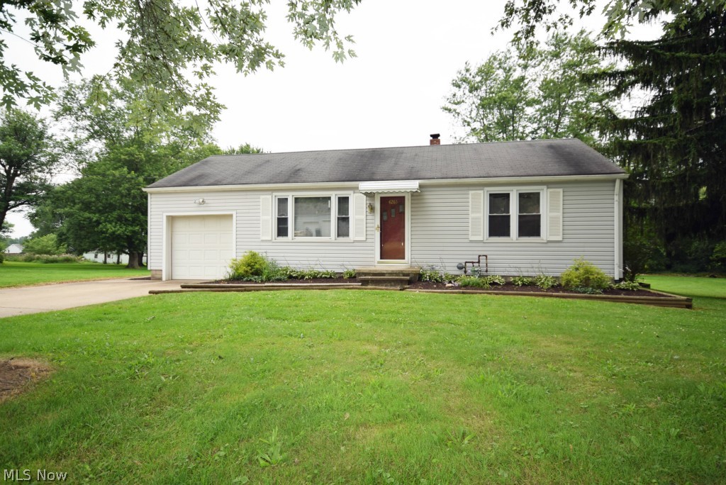 Charming 2 Bedroom/1 Full Bath Home on spacious picturesque lot. Home Features Include: Large Open Front Living Room, Awesome Updated Kitchen, 2 Bedrooms Upstairs, Could have a 3rd Bedroom in the basement, 1 Full Bath, and an Awesome 12 x 16 Heavy Duty Stained Back Deck leading to a Deep Double Wide Back Yard! Home Is Newly Painted, New Windows - 2001, Newer High-Efficient Furnace and A/C -2006, New Water Heater - 2012. Move in Condition, & Available Immediately!Home also offers a 8 x 12 Storage Shed. All flooring has been updated... Carpet, Hardwood, & Vinyl. Home offers Ceiling Fans & Double Wide Pane/Storm Windows. Home is Wired & Cable Ready. Driveway is Double wide - large enough to park 4 Cars. The Huge Back Yard is great for an Organic Garden, Beautiful Green Grass... or Both!!! This home has tons to offer and is a Must See! Don't wait til it's sold! Call today to schedule your showing!