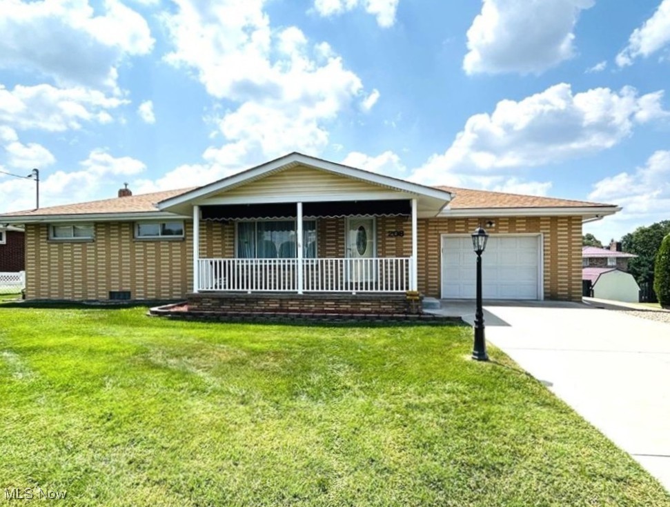 Looking for a home that's move-in ready with all the right updates? This 3 bedroom, 2 bath brick ranch is calling your name! A huge picture window floods the living room with natural light. The eat in kitchen includes all appliances. The main level bath has been nicely updated with a walk-in shower. The finished basement is a dream-massive bonus room, a second updated full bath with walk-in shower, and an incredible 40x14 laundry utility space (yes, the washer & dryer stay!). You'll love the main level garage for easy access into the kitchen and the covered back deck for year-round enjoyment. The yard is fully fenced with a handy storage shed-perfect for pets, play, or gardening.