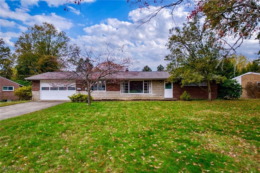Welcome home to this charming brick ranch in the heart of North Canton! Situated on a quiet street near Downtown North Canton, Washington Square, and The Strip, this home is just minutes from endless shopping, dining, and entertainment. Step inside to a large living room and adjoining dining area, with built-in features, oversized windows, and hardwood floors under the carpet. The fully-applianced kitchen features newer vinyl flooring and a great view of the backyard. There are 3 bedrooms with hardwood floors (one being under carpet). A full bathroom completes the main level. Downstairs you’ll find a partially finished basement, including a spacious recreation room with newer carpet, a 2nd full bathroom, multiple storage rooms, and a laundry area with a utility sink. Outside, you’ll enjoy a private backyard area with a covered patio off the 2-car attached garage. This well-preserved house has great bones and offers a clean slate to make it your own. Don’t miss this incredible opportunity to buy an appreciating asset in a fantastic location with so much value-add potential. Call today to schedule your private showing!