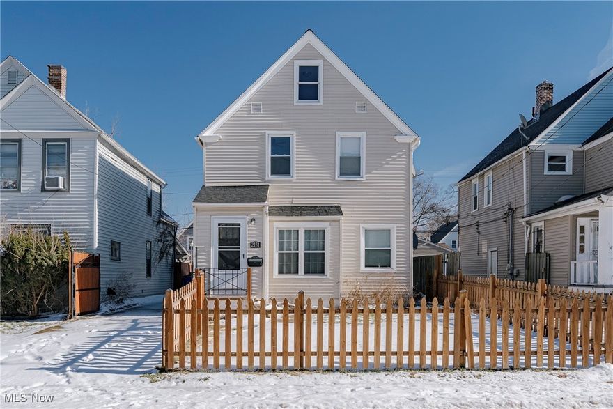 Welcome to 2131 W 104th Street – A Spacious, Move-In-Ready Home with Flexible Living Options! Step inside this well-maintained Cleveland home and instantly feel the warmth and space it offers. The front door opens into a bright, inviting living room filled with natural light, complemented by newer laminate flooring that flows seamlessly into the formal dining room—perfect for family meals, holidays, and everyday gatherings. The kitchen sits just beyond and is both stylish and functional, featuring newer cabinetry, stainless steel appliances, a classic tile backsplash, and durable LVP flooring. A sliding door leads to an enclosed porch/sunroom, creating a cozy bonus space for morning coffee, playtime, or relaxing evenings year-round. The first floor offers added convenience with a bedroom that has direct access to a full bathroom—ideal for guests, extended family, or flexible living needs. This bathroom is also accessible from the kitchen, making daily routines easy and efficient. Upstairs, you’ll find three additional bedrooms, each with its own character and mix of carpet, LVP, and laminate flooring. A second full bathroom completes the upper level, featuring a stone-top vanity and a beautifully tiled step-in shower. The full basement provides ample storage space and laundry connections, keeping everything organized and functional. Thoughtfully cared for and truly turnkey, this home is ready for its next chapter. Whether you’re looking for a comfortable family home or a smart investment opportunity, this property offers exceptional flexibility—with the potential to convert into a duplex with minor modifications. A solid home with room to grow, adapt, and invest—don’t miss this one!