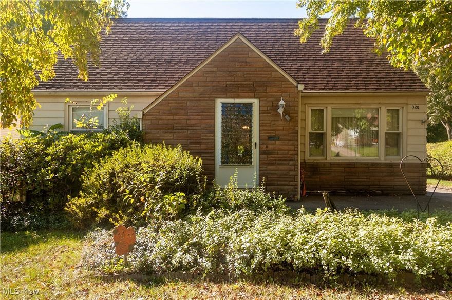 If you’ve ever wished you could bottle up the comfort of grandma’s house, this 3-bedroom Cape Cod on Youngstown’s west side might be the next best thing. Spacious and solid, this home sits on a beautiful lot and offers over 1,500 square feet of vintage charm and key updates. Inside, you'll find a sunny living room, an eat-in kitchen, and a formal dining room with original built-ins. The enclosed patio room is an adorable spot for reading, houseplants, or morning coffee. Two bedrooms and a full bath on the main floor make daily living easy, while the second floor opens into a spacious third bedroom with tons of built-ins (desks, storage bench and bookcase) and closets- perfect for guests, a home office, or playroom. Downstairs, the full basement includes a laundry area, workshop space, and a second full bathroom. Outside, you'll find the detached garage and a large, private backyard. Thoughtfully cared for over the years, this home includes newer vinyl windows, a hot water tank from 2019, and a furnace from 2023. It also qualifies for the At Home in Youngstown Grant, offering up to $25,000 in down payment or improvement assistance- a rare opportunity to make a solid, affordable home your own in a great location only minutes from Mill Creek Park, shopping and schools!