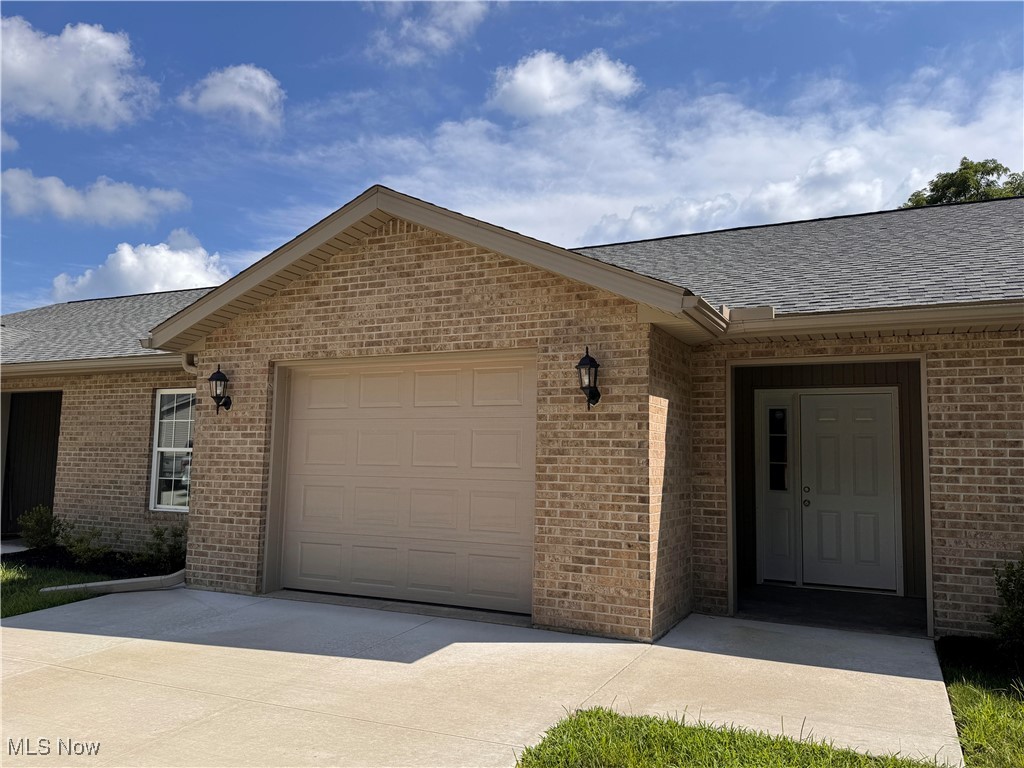 Get ready to pop the champagne, because new construction is here! Welcome to 203 Knollton Dr, Millersburg, tucked away in the final phase of the Brambly Hedge Knoll Condo Development. Front door is weather protected by the covered entrance. Step inside to a cozy nook with a double closet. The first floor is an open-concept wonderland, featuring skylights that flood the space with sunshine. Slide open the dining room patio door and step onto your future back deck (work not completed). Did we mention the green space? Oh, yes! And this condo offers a stunning view from the future deck and walkout basement straight to the patio. The galley kitchen is fully loaded with a brand-spanking-new stove, fridge, and dishwasher. Plus, there's an island perfect for your culinary masterpieces, and a second skylight. Laundry day just got a whole lot easier with a first-floor laundry closet. The primary bedroom is a storage dream with double closets, a linen closet, and a full bathroom. There's a second bedroom, another full bath, and an one-car garage to complete the first floor. Downstairs is a full, unfinished basement just begging for your personal touch. Oh, and it's a walkout to the patio with a view of the condo association’s lush green space. Talk about a slice of heaven!