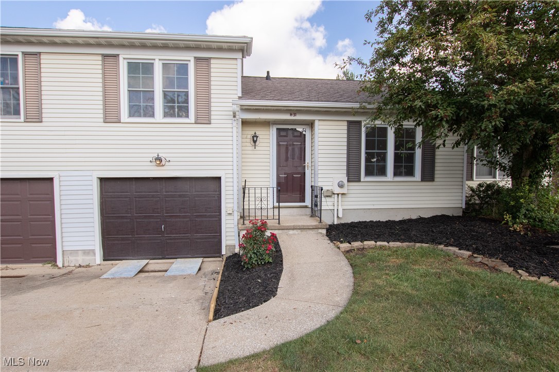 This beautifully updated 2-bedroom, 1.5-bath home offers comfort, style, and functionality in every detail. The main floor features an open-concept eat-in kitchen and living room. The kitchen has been refreshed with new appliances, and modern cabinets. The home boasts fresh paint, bright LED lighting, new LVP flooring on the first floor, and new carpet upstairs. The bathrooms have been upgraded, including a brand-new tub and surround, plus new vanity cabinets. A versatile rear room off the garage provides the ideal space for a home office or workout area. Additional updates include, newer roof, serviced AC, baseboard heaters, and white outlets , switches, and covers. The home has a 2015 electric hot water tank, and a Mitsubishi heat pump AC system. This move-in-ready property combines modern upgrades with practical features for year-round comfort. Minutes to both Brunswick and Strongsville shopping, and restaurants. Move in ready. Schedule a tour today!