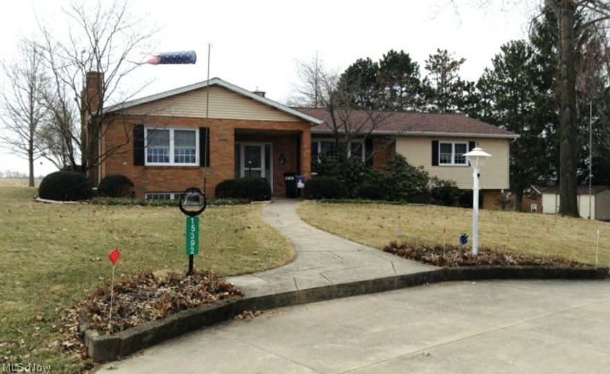 This is one of those properties that doesn't come along too often! Don't miss it!  Extremely nice four bedroom ranch with three full baths!  Master bedroom has a master bath. Dining has sliding doors to large covered patio.  So much living space with a first floor family room and additional rec room in the lower level.  The kitchen has Amish made Hickory cupboards and plenty of them! Two lazy susans, pull out drawers,pull out trash can!  Lots of counter top area also! Convenient first floor laundry room with door to outside.  The walk out lower level (access through attached garage) is another living area, complete with a full kitchen, bedroom, full bath, and additional office room. Updates include newer windows and doors through out, new C/A (2013) Lots of closets and storage space!
You will love the 30x40 additional garage.  Doors are high enough for a motor home, plus a work shop! You must see it too appreciate all it has!
Lovely perennials surround the home.