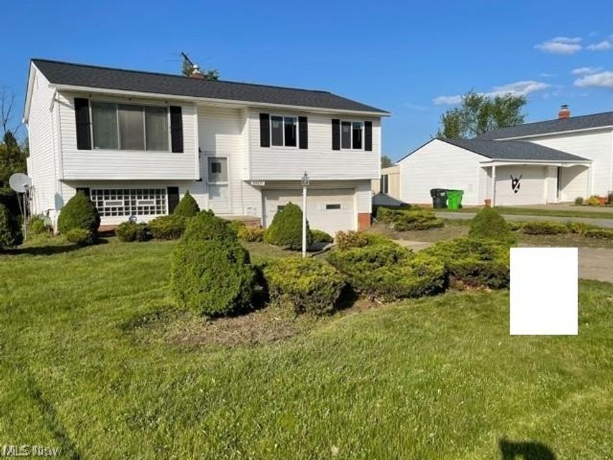 ***Update*** Seller completed all violations on the POS inspection. Garage door will be replaced by the seller. The AC unit was serviced.  New water heater installed among other repairs and updates. See updated photos!

Beautiful newly renovated home with ceramic tile throughout the entire house. New updated ceilings contains recessed lights and updated light fixtures. New windows in all bedrooms. New patio door installed with freshly painted deck. A new staircase is installed to the left of the deck. Bedroom and stairs contains ceramic flooring as well! The kitchen is updated with brand new cabinets and beautiful custom white granite countertops that accompanies a new gas stove,  stainless steel refrigerator and stainless dishwasher! The sink and faucet are also new along with the range hood. Two full bathrooms update with beautiful large tiled walls, new showers, new vanity sets and light fixtures. New water heater and new plumbing! Beyond the wooded backyard is a beautiful park th