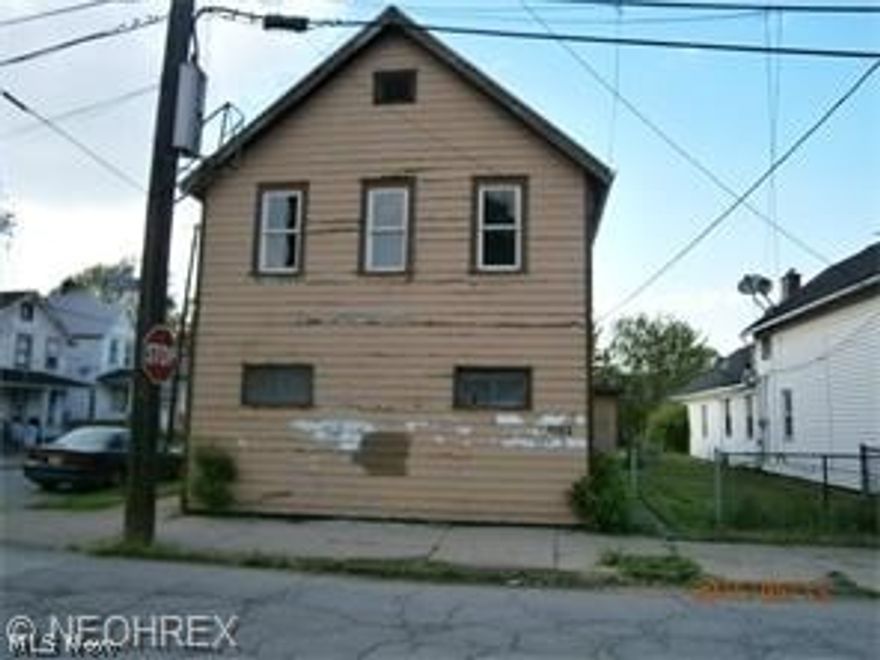 Huge two family home on corner lot. 4 bedroom up and 4 bedroom down. 1 full bath in each suite. Some work completed. Property sold as is. Fantastic opportunity!