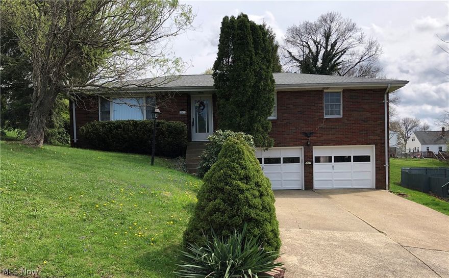 What a great move in condition home! Start packing for this roomy and reasonable 3 bedroom 2.5 bath home has a large open kitchen dining room, ample storage cabinets and counter tops. Conveniently walks out to the covered rear patio for great entertainment space that can be used in all types of weather. Large and well lit living room, 3 spacious bedrooms and 2 have double closets. Nice and bright full bath and also a 1/2 bath on the first floor.  The spacious lower level has a great immaculate recreation/office area with fireplace, nice laundry room with storage and folding area and another full bath. The garage is a great size with storage cabinets and walk out to yard.
This home is ready for you! Make that appointment soon! Home Warranty