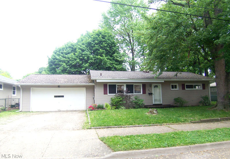 Wow! Contemporary Ranch on double lot. What more could you ask for? 2 car attached garage, maintenance free vinyl siding, all bedrooms have replacement windows. Kitchen completely updated with new stainless appliances, cabinets, Allure flooring & more. All carpet on first floor is new including Sun Room. Sun Room has wood burning stove for "year around" heat. Every room including basement has just been painted in fashion neutrals. Huge basement is partially finished and has a convenient sink and commode. Huge back yard is private and fenced with two gates. Full bath completely updated with vanity surround and more! Comes with a 1 year warranty from America's Preferred. This isn't going to last! Hurry!