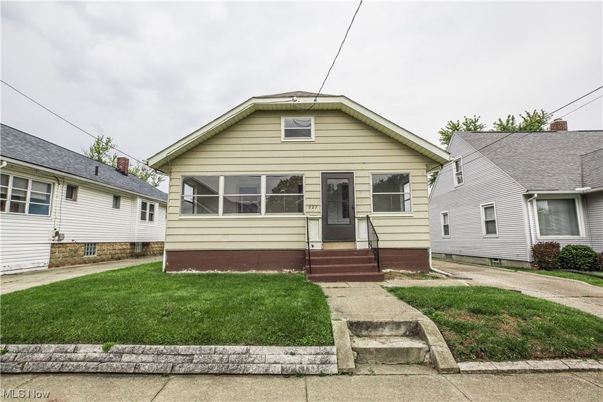 Looking for a cute ranch home? Stop looking - you found it! This 2BR, 1BA is perfect for a starter home, down-sizers or investors! As you step inside, you'll immediately notice the charming hardwood floors that flow throughout. The freshly painted interior adds a bright, clean, and welcoming atmosphere, making it easy to envision your personal style in every room. The spacious living areas are well-lit, and most windows have been upgraded to vinyl replacements. One of the highlights of this home is the large porch, where you can enjoy your morning coffee or favorite evening beverage of choice. The fenced in backyard is the perfect spot for entertaining, gardening or simply unwinding in the fresh air. The lower level has a partially finished room that could be used for an office or rec-room. Other updates include roof (approx. 8 years) and electrical panel. Convenience is key with this property, as it is located close to highway access, making your daily commute a breeze.  Don't miss out on this one...call your favorite Realtor to schedule you're showing today!