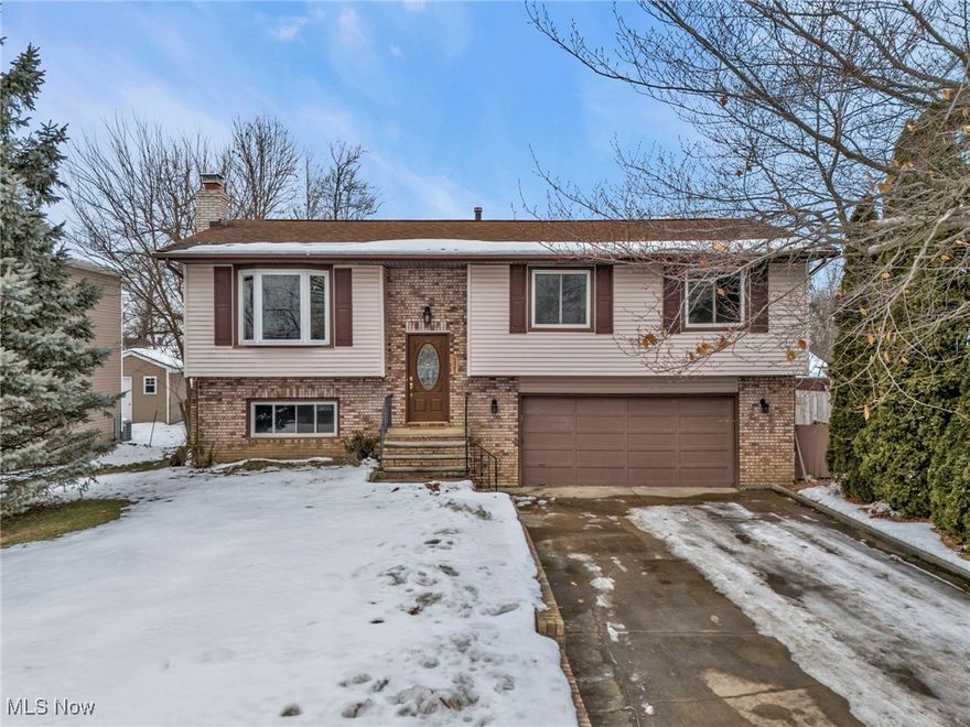 Welcome to this inviting 3-bedroom, 2.5-bath home, perfectly situated in the heart of Northfield. Offering a wonderful opportunity for you to create lasting memories!

When you enter, you’ll step up into a spacious and bright living room, which flows seamlessly into the dining area. From there, step outside onto the back deck—recently updated with new deck boards—perfect for relaxing or entertaining in the fresh air. The kitchen (updated 2021), is conveniently located just off the living and dining areas, making it ideal for entertaining.

On the main floor, you'll find the primary bedroom, complete with its own ensuite bathroom featuring a walk-in shower. An additional full bathroom and two bedrooms are located on the first floor for your convenience.

Downstairs offers a cozy rec room area with a fireplace, perfect for movie nights or gatherings. A half bath is also located on this level, along with access to the 2-car attached garage with Nature Stone flooring.

The fully fenced backyard provides ample space for outdoor activities and relaxation. Additional updates include a new AC unit (2022) for year-round comfort, as well as fresh paint throughout the home (2021). The retaining wall supports come with a lifetime warranty for added peace of mind. Plus, a 1-year America's Preferred Home Warranty is included for added buyer confidence.

Located across from Huntington Park and close to local dining, parks, and the casino, this home offers both tranquility and easy access to all Northfield amenities. 

Call your favorite agent to schedule a showing, and make this charming home yours today! AGENTS READ REMARKS!