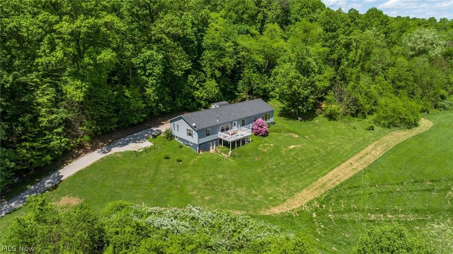 Nestled in the serene and secluded countryside, this magnificent property offers the perfect blend of privacy and convenience. Boasting over 15 sprawling acres that seamlessly blend with the pristine beauty of the adjacent Tri-Valley Wildlife Area, this property is a nature lover's paradise. The expansive 2280 sqft. home features a full basement and an open floor plan that is perfect for relaxing and entertaining. With four spacious bedrooms, two bathrooms, and two inviting living areas, there is ample space for all your needs. Located in the highly sought-after Tri-Valley school district, this property offers a tranquil retreat and easy access to the nearby Muskingum River boat ramp. Don't miss out on the opportunity to make this breathtaking property your slice of heaven!