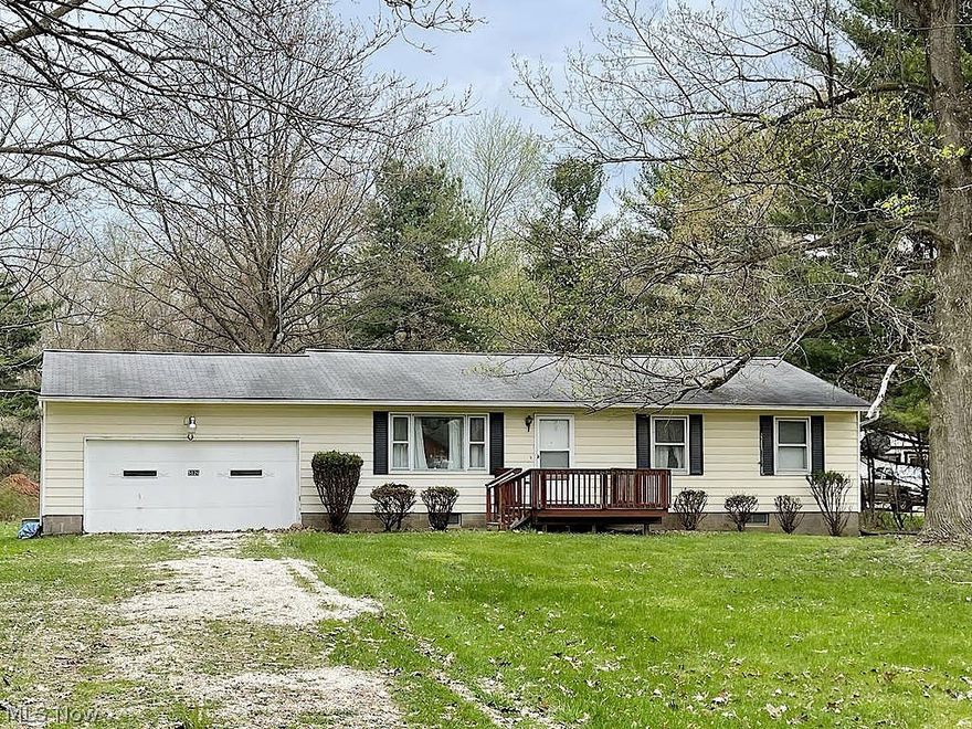 You’ll see possibilities immediately in this one-story ranch home on a near full acre lot, in Green. Sitting perfectly between North Canton and Akron, it’s a well-built 3-bedroom home chock full of cherished memories, as it’s been in the same family for over 40 years! The living room has a nice picture window that looks out to the large front yard. You’ll love the charm of the hardwood flooring in the bedrooms, and under carpet on the main level. The kitchen has ample counter space for food prep, for dishes and is spacious enough for a kitchen table. Something you’ll appreciate here, that can be a rare find in a ranch home, is a dining room! The basement is super long and will be a great space for storage or a workshop. If you like to host cookouts and family gatherings, the sweeping yard goes back over 300 ft. and will be great for hosting friends and family. If you favor a strong sense of community, the City of Green has so much to offer including the newer Central Park; a jewel in t