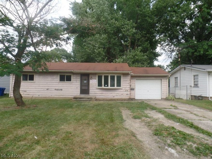 3 bedroom ranch with 1 car garage, full basement eat-in kitchen, and large rear yard. Liberty Schools. Purchasing "AS-IS". Most hardwood floors. Girard water, Trumbull County Sewers. Great Investment! Needs TLC.