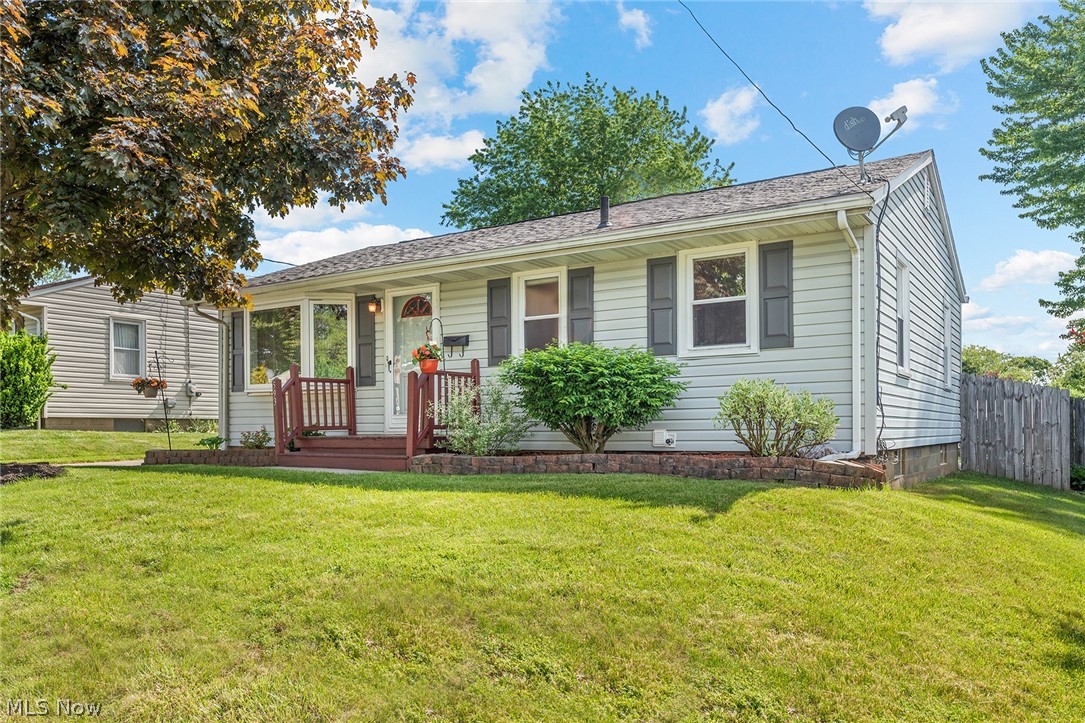 Dont miss this light filled and exceptionally well maintained Ranch available in Ellet! Spacious and sunny living room with bay window lead to a beautifully remodeled eat in kitchen with new cabinets and flooring, stainless appliances, and quartz counters. Three generously sized bedrooms, one with double closets! Updated first floor bathroom as well with new flooring and lighting. Enjoy the outdoors on your low maintenance and tastefully done stamped concrete patio with large privacy fenced yard. Newer concrete drive and a huge 2+ car garage built in 2009. Downstairs you'll find a spacious full finished basement with nature stone floors, a gas fireplace, a full bath (with a stand up shower) and an office as well as plenty of storage! Additional features include gleaming wood floors, replacement windows throughout, Leaf Filter gutter guard, new back steps, exterior and storm door, new front shutters, plus updated plumbing! This beauty is truly move in ready! Schedule a showing wit