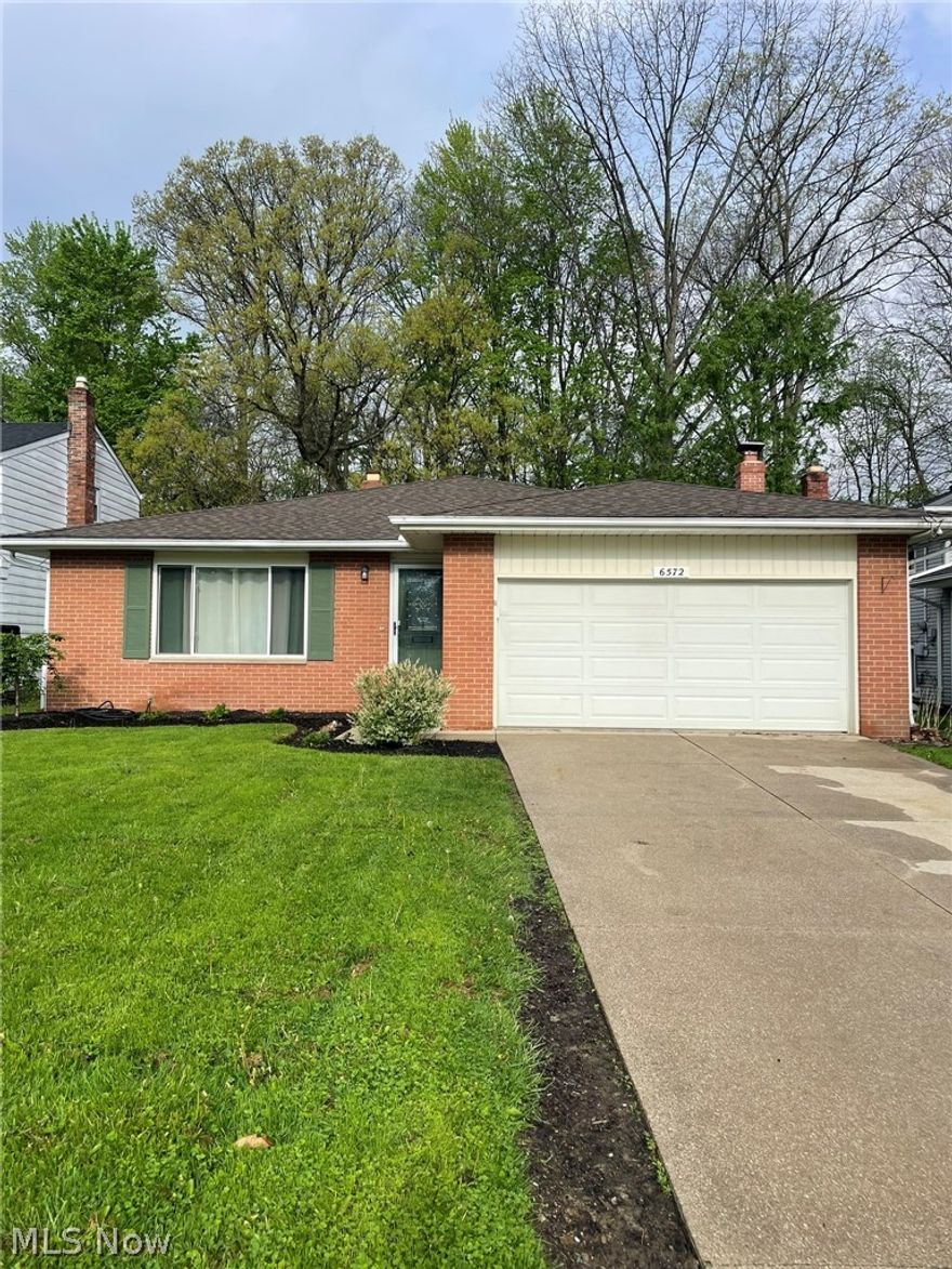 Welcome to your dream home in one of Solon’s most desirable neighborhoods! This charming single-family residence offers the perfect blend of modern updates and timeless appeal—ideal for families or first-time home buyers seeking comfort, convenience, and quality.

Step inside to discover three spacious bedrooms and one and a half beautifully renovated bathrooms. Both bathrooms feature fresh updates, including new toilets, a double sink vanity, and a luxurious fully tiled shower surround. The heart of the home, the kitchen, has been thoughtfully remodeled with elegant new cabinets boasting soft-close hardware, striking quartzite countertops, and a convenient garbage disposal. Appliances—including a nearly new range, microwave, dishwasher, and refrigerator—are all included for your move-in ease.

Enjoy the warmth and character of refinished hardwood floors, complemented by new Pergo flooring for durability and style. The inviting living area centers around a functional fireplace, perfect for cozy evenings with loved ones. Downstairs, the basement has been fully waterproofed by the previous owner, offering peace of mind and extra storage or recreation space.

Step outside to a fully fenced backyard—ideal for pets and play—with a handy storage shed and an attached two-car garage. Located less than a mile from top-rated Solon schools, the library, and the community center, this home puts everything you need within easy reach. Don’t miss the chance to make this updated, move-in ready home yours! Schedule a tour today!