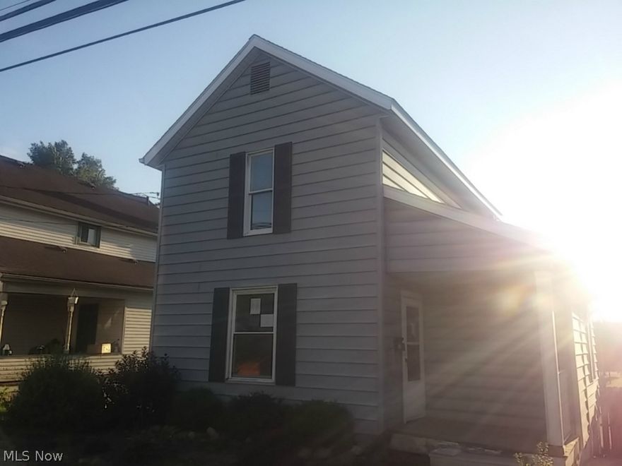 Two story home with a basement walkout, close to US 30. Home has wood floors, lots of natural light from windows, a kitchen with tons of storage, and more!