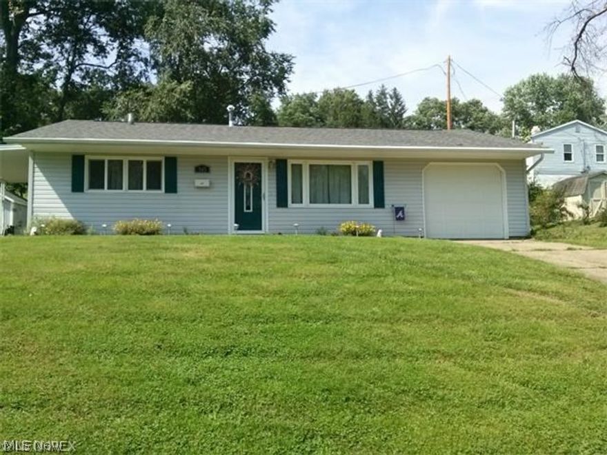 This cute Northend home has so much to offer. Beautifully updated kitchen with newer cabinets, tile, counter tops and flooring. Newer roof in 2006. Extra room off bedroom. could be used as office or weight room. Pull down steps in garage for extra storage above garage.