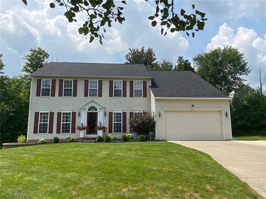 Don't miss this Streetsboro Gem!  A MUST SEE   This beautiful Colonial has 4 spacious Bedrooms and 5  bathrooms with a fully finished lower level, including a workout room and theatre room.   Quality finishes and upgrades throughout.   You will fall in love with the recently upgraded custom designed kitchen with off white solid wood cabinetry and a large island with granite countertops.  You can watch the sunrise sipping coffee in the stunning morning room and gather with friends and family in the cozy and inviting family room.  There is an abundance of  space for entertaining in the formal dining room and living room.  The two level deck (with solar lighting) off of the back of the home will enhance your summer get-togethers while overlooking the professionally landscaped yard.  The property is on a cul-de-sac which allows for maximum privacy.