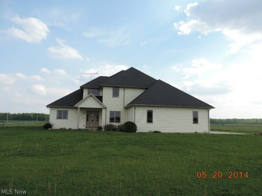 5 bedroom 2.5 bath home located in a rural setting. This home has too many features to list but here are some; Interior: No carpet, Hardwood/laminate/tile through out, 2 story living room with balcony and fireplace, kitchen with island and stainless appliances, Laundry room with sink and cabinets, huge master bedroom, jetted tub in up stairs bath finished basement with garage stairway and more! Exterior Features include; 2.03 acres, fenced in back yard, large back porch, quality siding and roofing materials and more! Property is being sold AS-IS