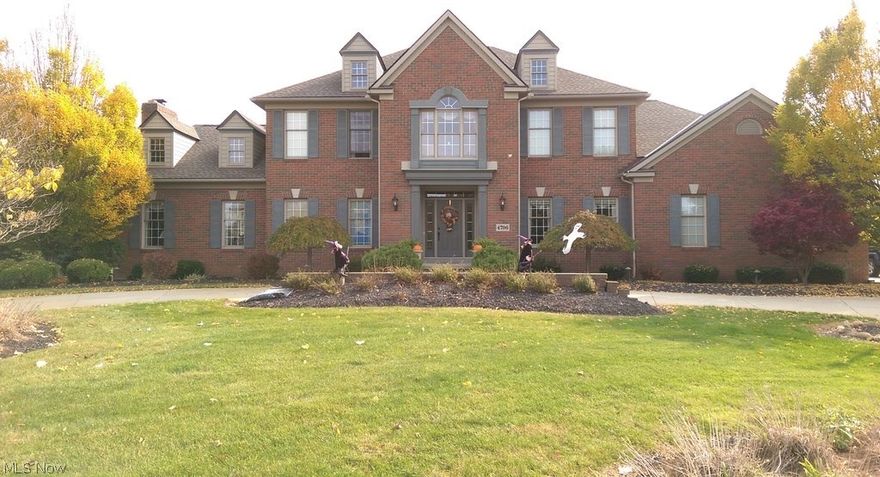 Beautiful brick & cedar 4 bedroom, 4.5 baths traditional home located on secluded mature tree lined, private setting 2.46 acre lot in Bath Reserve Estates. Amenities galore: Hardwood floors, office with built ins, 4 fireplaces, new roof, new carpet, new HVAC, full house generator, full house sound system, additional approx. 1,500 square feet in the finished lower level, complete with copper ceiling tiled bar area, work out room, spa like full bathroom area with steam sauna/shower and Helo Brand sauna. Wine room with cedar closet. Pool table included with sale! Large deck overlooking beautiful saltwater in- ground heated gunite/fiberglass pool.  Deck includes granite bar area with beverage cooler, ice maker and kegerator. Also, large Viking gas grill and fire pit.  Owners willing to sell home nearly completely furnished (move in ready).